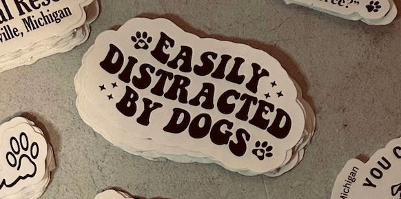 “Easily Distracted by dogs” sticker